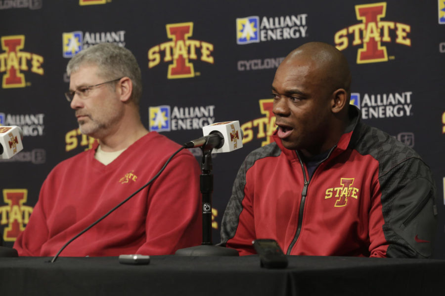 New Iowa State football hires Louis Ayeni (right) addresses the media along with head coach Paul Rhoads on Jan. 9 in the Pete Taylor Media Room at Hilton Coliseum. Ayeni was the run game coordinator at Toledo before joining Iowa State. In 2013 Toledo averaged 240.6 rushing yards per game.