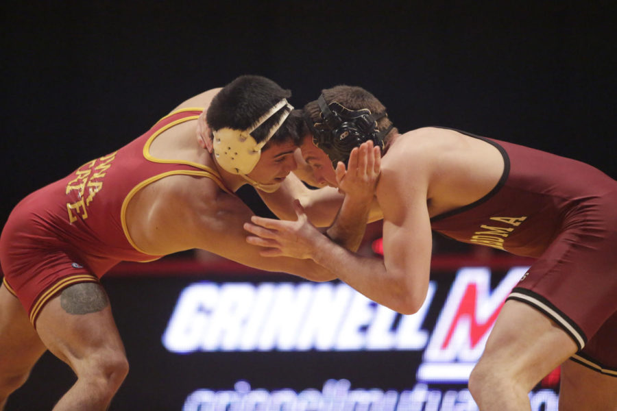 Redshirt junior Mike Moreno,165 lbs, grapples with his opponent Jan. 12 at Hilton Coliseum. Moreno won by major decision. Iowa State lost the dual to Oklahoma 11 to 27.