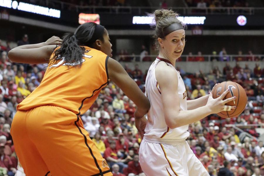 Senior forward Hallie Christofferson attempts to pivot off her defender during Iowa States 69-62 loss to Oklahoma State on Jan. 11 at Hilton Coliseum. Christofferson got into foul trouble late in the game.