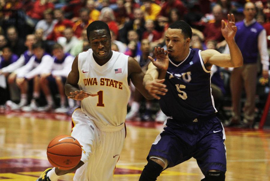 Iowa States Bubu Palo dribbles the ball up against the TCU Horned Frogs on Feb. 16 at Hilton Coliseum. The Cyclones defeated the Horned Frogs 87-53.

