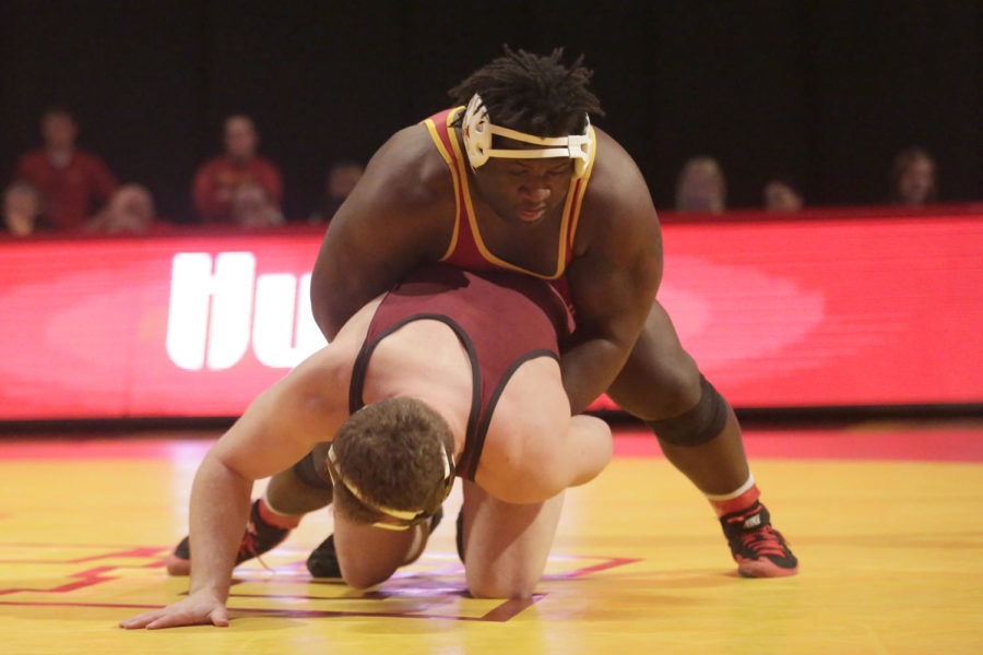 Redshirt freshman Quean Smith attempts to takedown his opponent on Jan. 12 at Hilton Coliseum. Smith won by major decision. Iowa State lost the dual to Oklahoma 11 to 27.