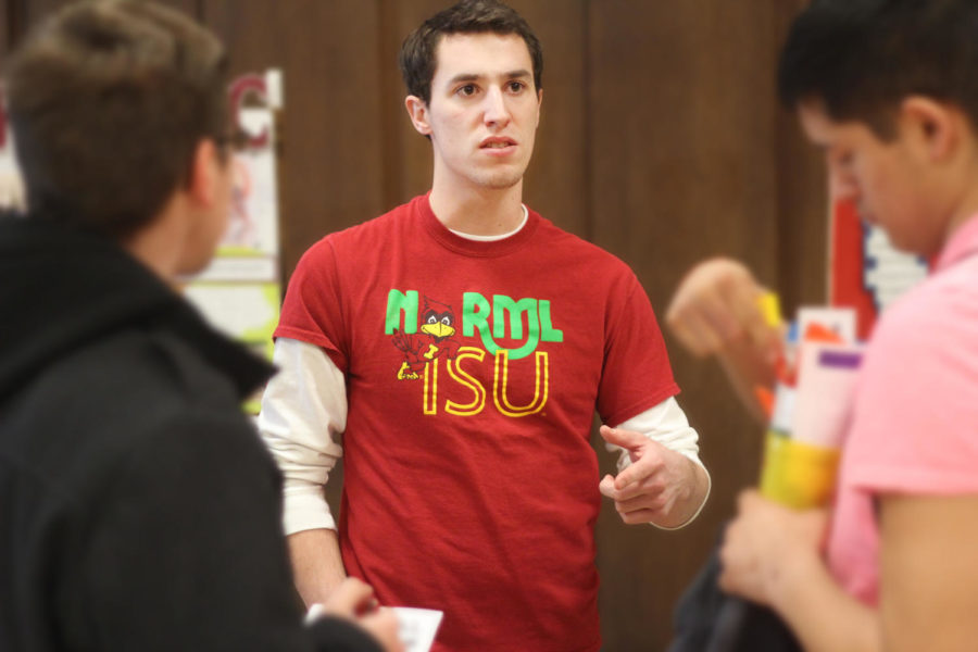 Mike Bankers, a junior in industrial engineering and management, talks with students about the ISU chapter of NORML. NORML, or National Organizations for Reform of Marijuana Laws, acts on campus to spread information about what the club stands for.