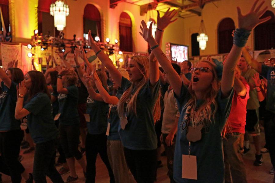 Dance Marathon participants dance to a mash of songs during a morale dance section of the night in the Great Hall during Dance Marathon 2014 on Jan. 25 at the Memorial Union.