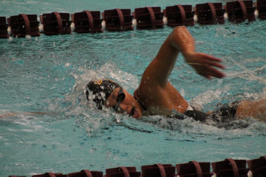 Mid. Distance swimmer Karyl Clarete powers through the final leg of the 1,000 meter Freestyle. Clarete would go on to take first with a finishing time of 10:11.15.