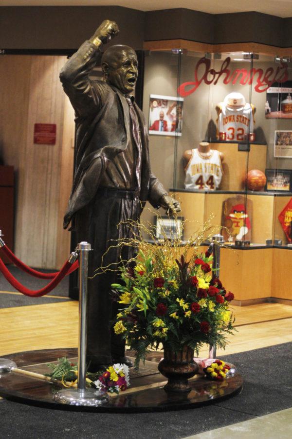 Former coach Johnny Orrs statue was adorned with flowers from fans before the game against Northern Illinois Dec. 31, 2013. Orr died early on Dec. 31 at age 86.