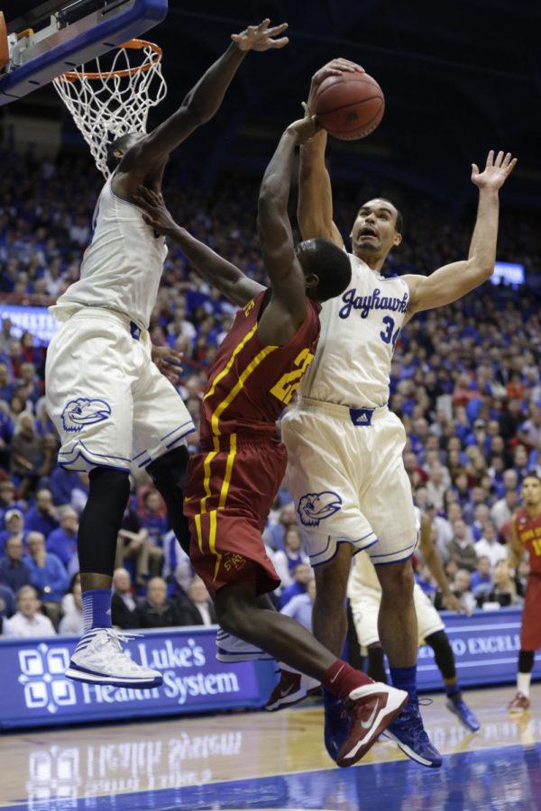 Junior forward Dustin Hogue gets blocked by Kansass Perry Ellis during Iowa States 92-81 loss to Kansas on Jan. 29 at Allen Fieldhouse. 