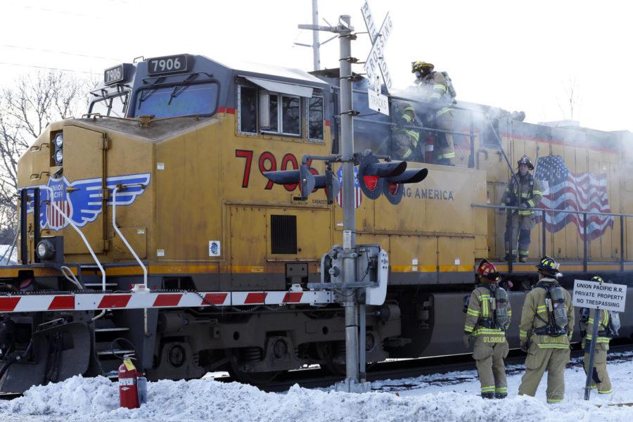 A train heading east stopped on the tracks near the intersection of 6th Street and Hazel Avenue in Ames Feb. 12 due to a fire on board.