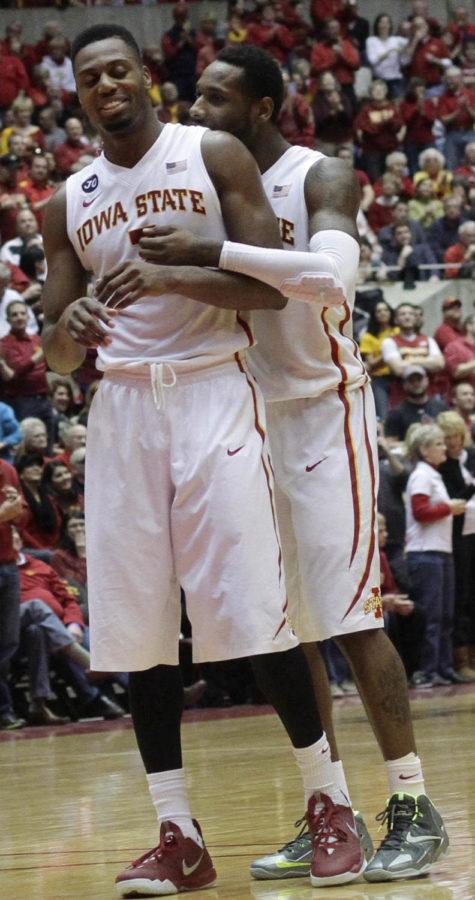 Senior guard Deandre Kane hugs senior forward Melvin Ejim on Feb. 8 at Hilton Coliseum. The Cyclones beat the Horned frogs 84-69. Ejim set a Big-12 single game record with 48 points, in addition to a career-high 18 rebounds.