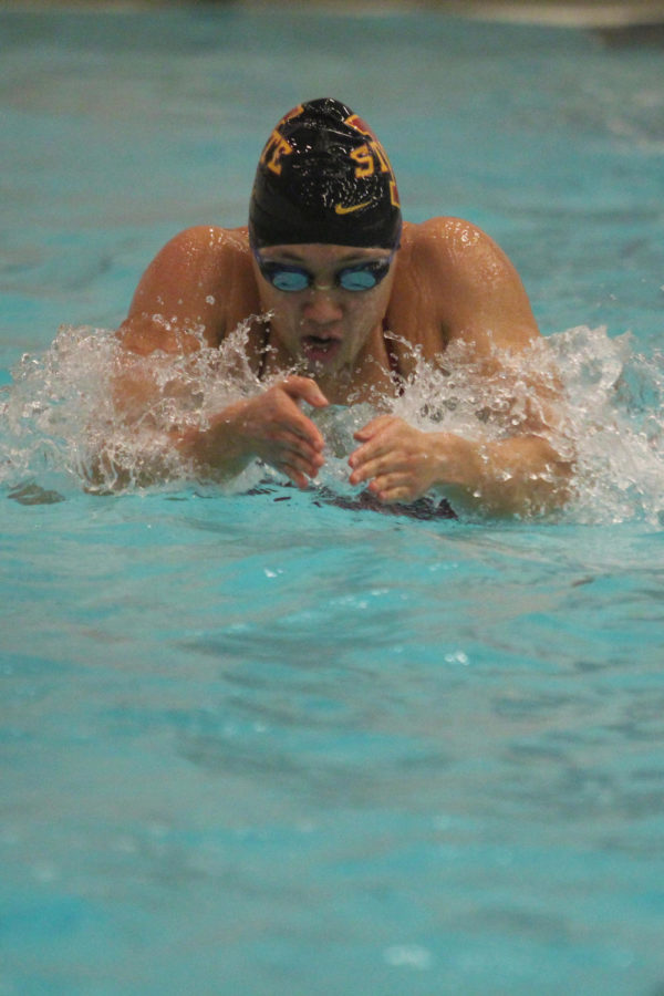 Imelda Wistey, senior in English, swims breast stroke and free style during practice Monday, Dec. 2.