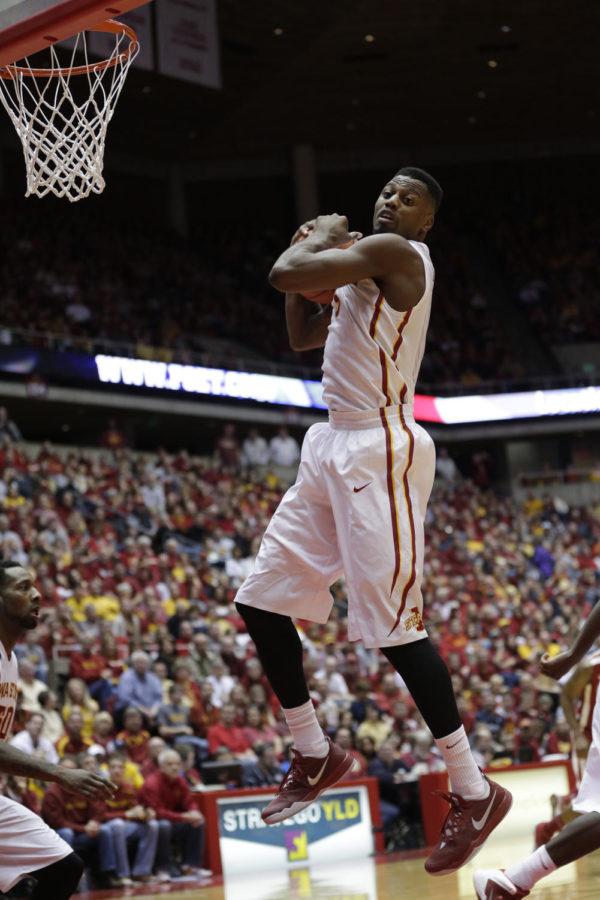 Senior forward Melvin Ejim rebounds the ball during Iowa States 81-75 win over Oklahoma on Feb. 1 at Hilton Coliseum. Ejim became only the fifth Cyclone to have 900 career rebounds and finished the game with 906.