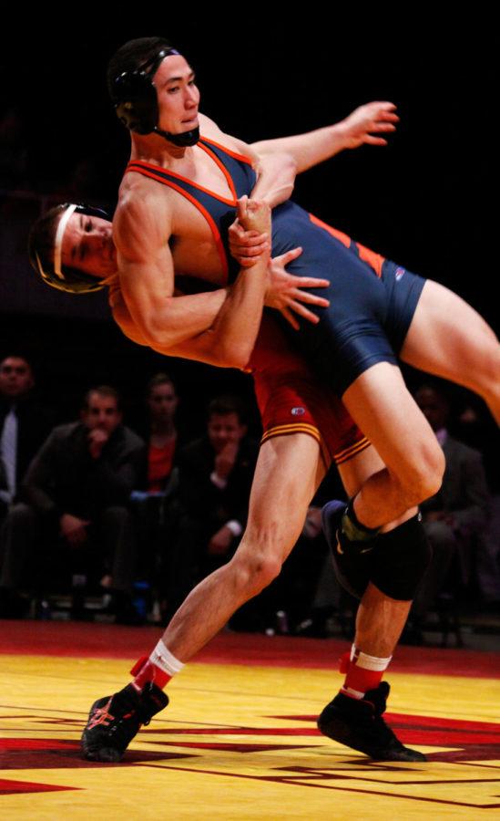 Gabe Moreno power slams his opponent at 141 pounds. Iowa State defeated Midland on Friday, Nov. 15, at Hilton Coliseum 38-3.