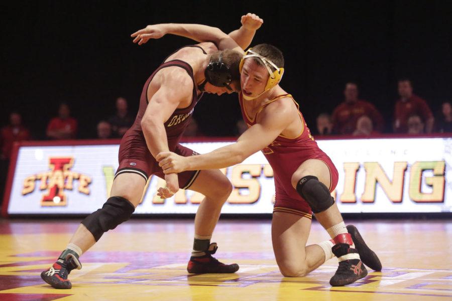 Redshirt+sophomore+Tanner+Weatherman%2C+174+pounds%2C+grapples+with+his+opponent+on+Jan.+12+at+Hilton+Coliseum.+Weatherman+lost+by+technical+fall.+Iowa+State+lost+the+dual+to+Oklahoma+11+to+27.