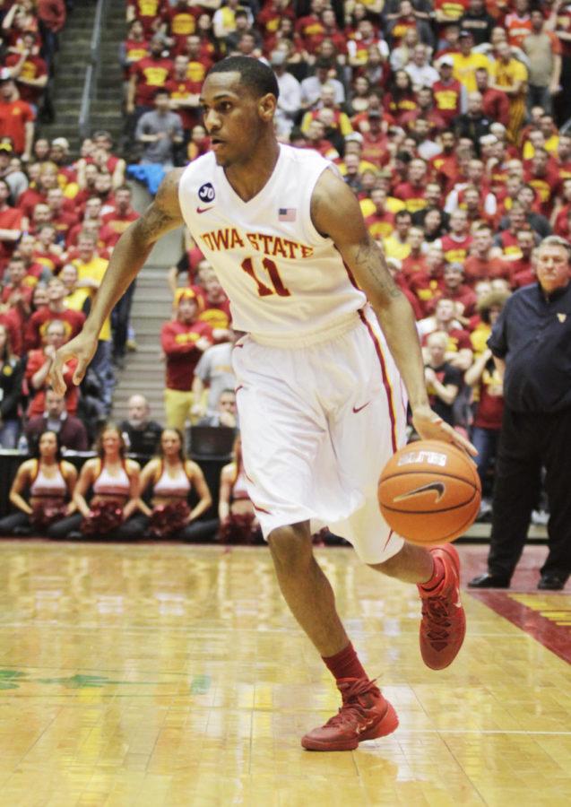 Freshman Monte Morris drives the ball down the court during the second half of the game against West Virginia on Wednesday, Feb. 26, 2014. The No. 15 Cyclones defeated the Mountaineers 83-66.