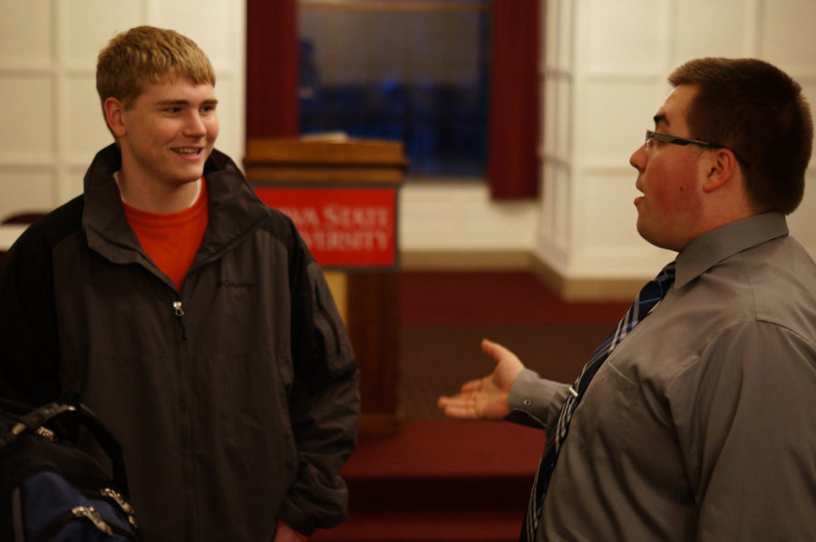 At the kick-off of the election on Jan. 24, election commissioner Adam Guenther talks to GSB Senator Nate Byro in the Cardinal Room.