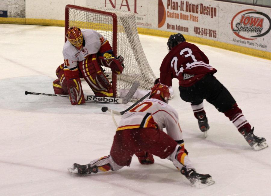 Junior goalie Matt Cooper blocks a shot from a Indiana opponent during the first of two match-ups between the teams on Jan. 10. Cooper saved 24 out of 26 attempted goals during the game.