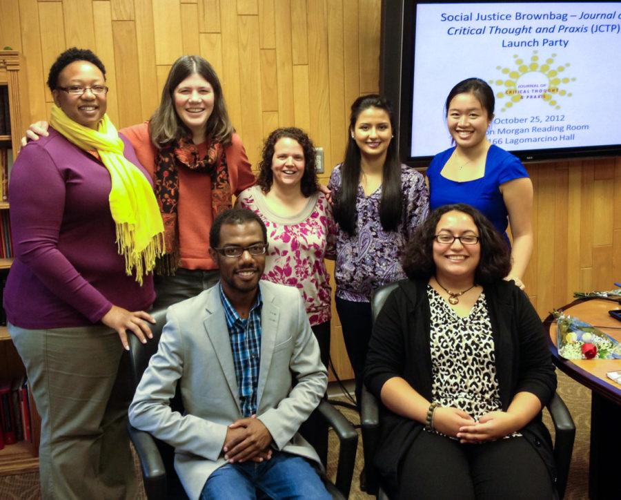 Graduate students in the School of Education who founded the Journal of Critical Thought and Praxis include (front, from left) Cameron Beatty, Lisette Torres, (back, from left) Aja Holmes, Jessica Soulis, Kathleen Gillon, Susana Hernandez, and Joyce Lui. They recently won a national award courtesy of the American College Personnel Association for the online journal they created.
