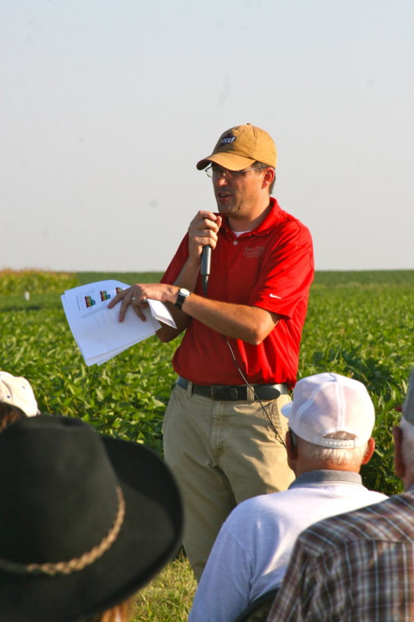 Matt Helmers speaks at a public field day on Sept. 1, 2011. Helmers is an associate professor in agriculture and biosystems engineering is co-manager of Iowa Learning Farms which is working to improve conservation practices throughout the state and nation. 