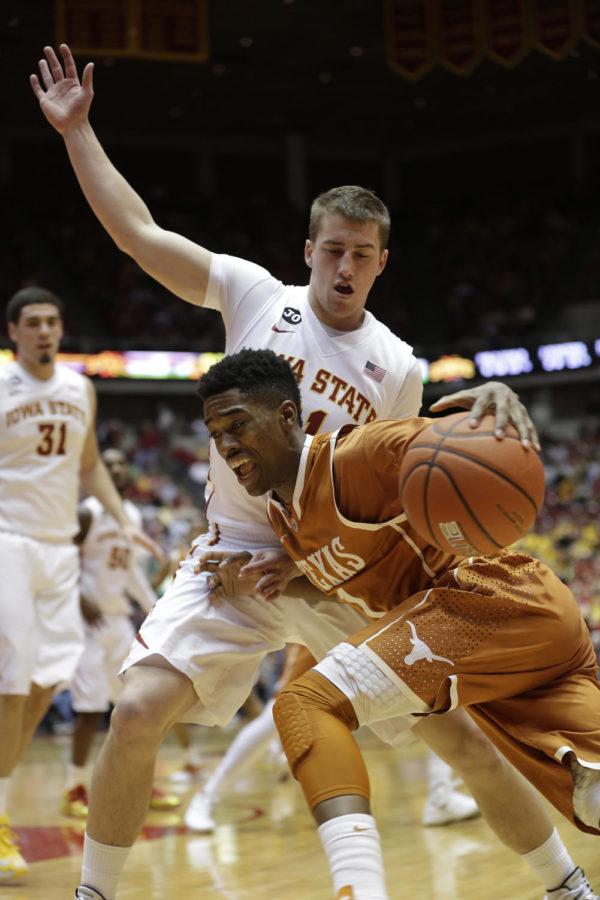 Freshman guard Matt Thomas attempts to maneuver the Texas player out of bounds during Iowa States 85-76 win over Texas Feb. 18 at Hilton Coliseum.