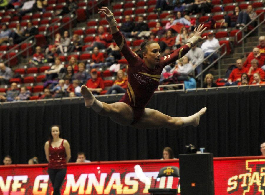 Senior+Henrietta+Green+competes+in+the+floor+against+West+Virginia+on+Feb.+7+at+Hilton+Coliseum.+Green+received+a+9.875+in+her+floor.+Overall+the+Cyclones+won+196.025+to+194.175.