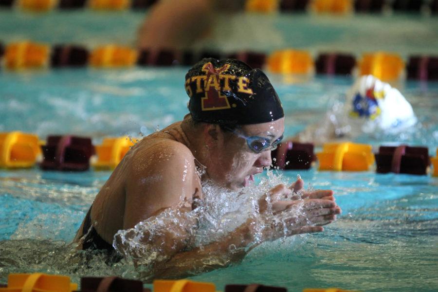 Freshman Karyl Clarete competes in the 500 freestyle competition during the Senior Day conference against the Kansas Jayhawks at Beyer Hall on Feb. 8. Clarete took first place, and the Cyclones took the win over Kansas 163.5-136.5.