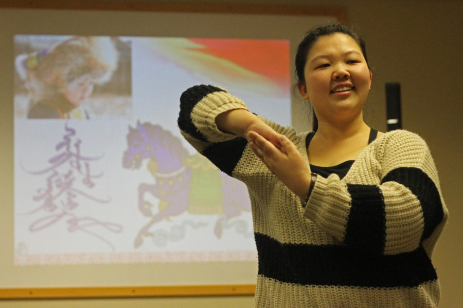 In prep for the Chinese New Year celebration taking place Feb. 7, a dancer practices her presentation of a traditional dance that will be performed.