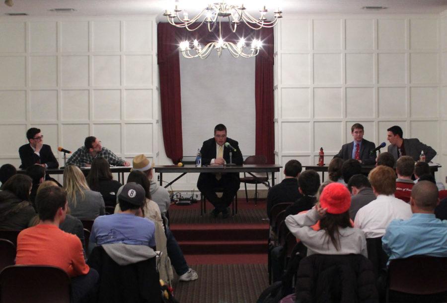 Candidates square off during the Government of the Student Body vice presidential debate in the Memorial Union on Feb. 17. Despite the important role the organization plays in university affairs, GSB meetings and elections generally do not garner much attention from students.