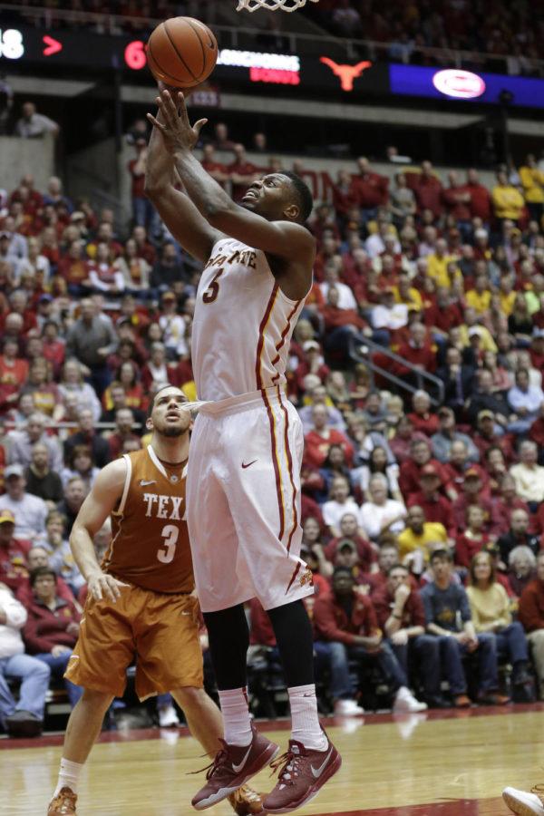 Senior forward Melvin Ejim attempts a layup during Iowa States 85-76 win over Texas Feb. 18 at Hilton Coliseum. Ejim scored 25 points and had eight rebounds along with two steals in the game.