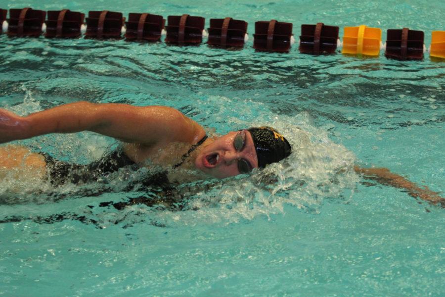 Freshman Karyl Clarete competes in the 500 freestyle competition during the Senior Day conference against the Kansas Jayhawks at Beyer Hall on Saturday, Feb. 8. Clarete took first place, and the Cyclones took the win over Kansas 163.5-136.5.