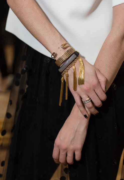 These E. Kammeyer Accessories bracelets feature the brands signature tassels.
