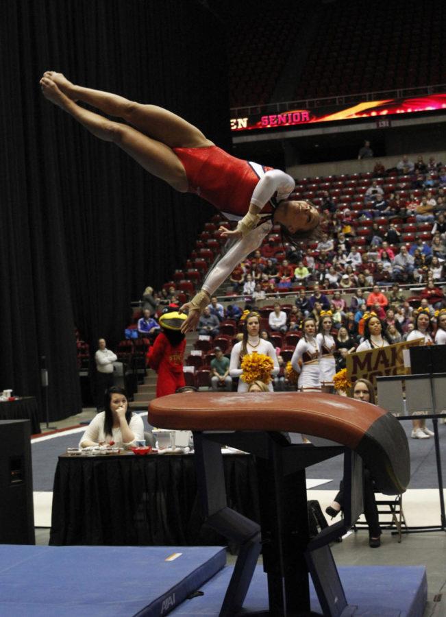 Senior Henrietta Green competes in the vault on March 7 at Hilton Coliseum. Green received a 9.75 for her vault in the Cyclones 195.925-192.775 victory against Iowa.