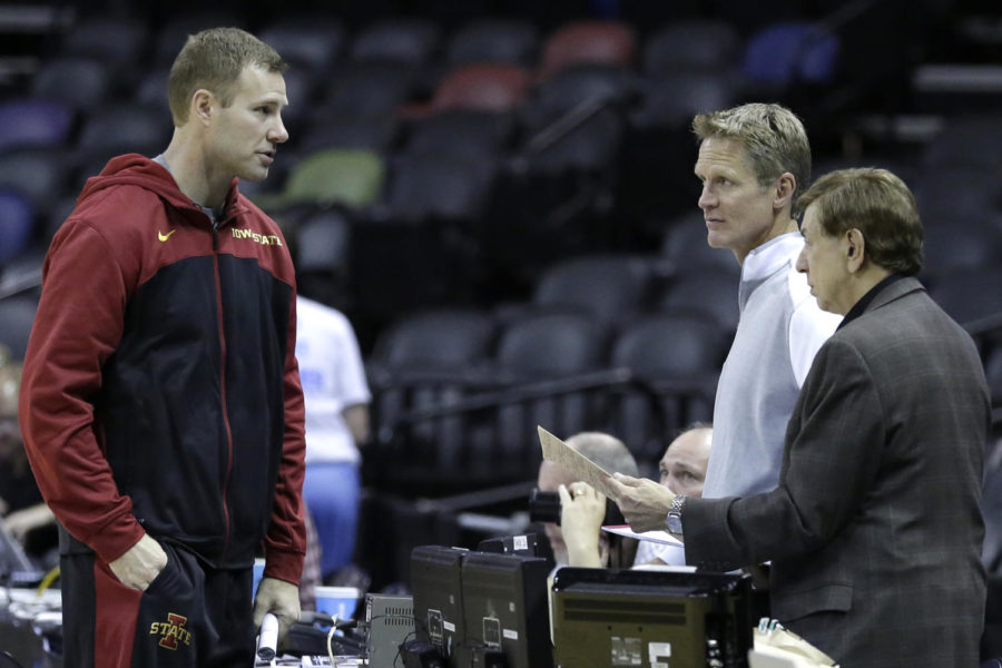Mens head basketball coach Fred Hoiberg, left, talks with former NBA player turn analyst Steve Kerr, in white, during Iowa States open practice. The Iowa State mens basketball team had an open practice Thursday, March 20 at the AT&T Center in San Antonio, Texas. 