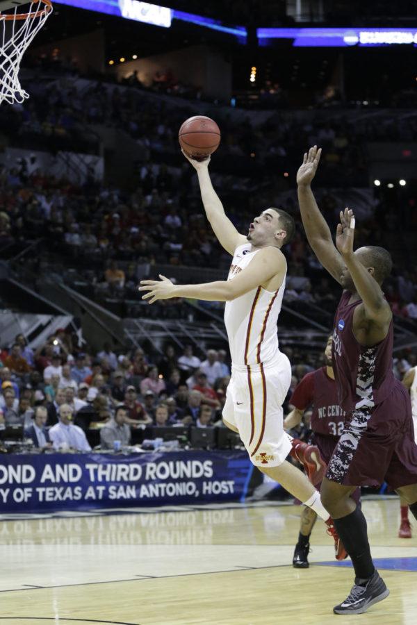 Sophomore forward Georges Niang attempts a shot during Iowa States 93-75 win against North Carolina Central in the second round of the 2014 NCAA Basketball Championship at the AT&T Center in San Antonio. Niang led the Cyclones in scoring with 24, even though he left the game with a broken foot with more than seven minutes left.