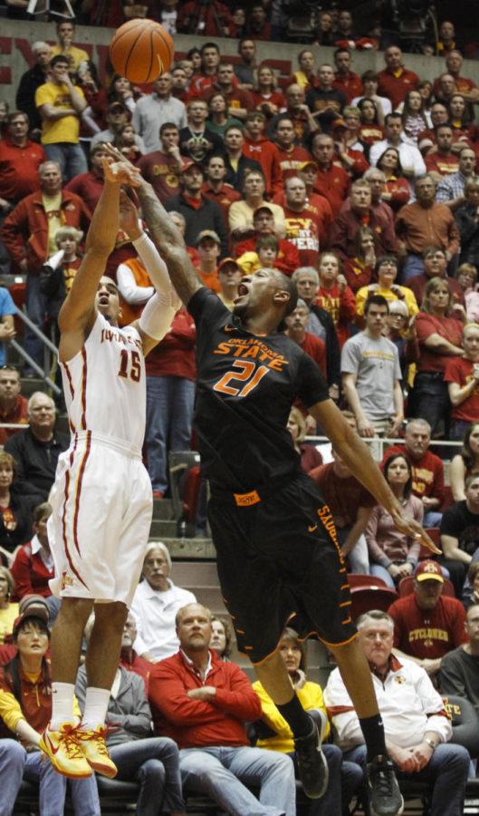 Sophomore guard Naz Long goes for a 3-pointer against Oklahoma State on March 8 at Hilton Coliseum. The Cyclones beat the Cowboys 85-81. Long had 14 points, including a 30-foot triple at the buzzer to send the game into overtime. 