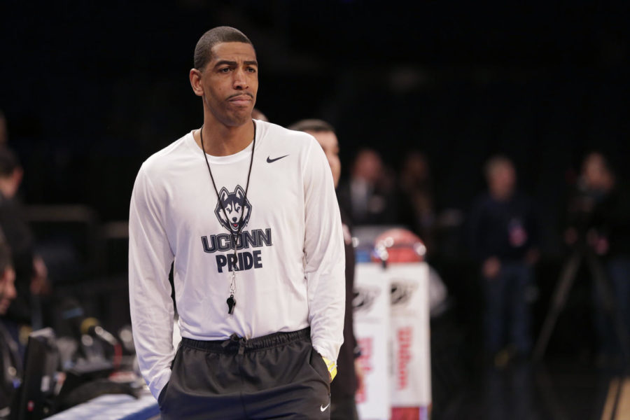 UConn head basketball coach Kevin Ollie watches his team practice on March 27 at Madison Square Garden in New York City.