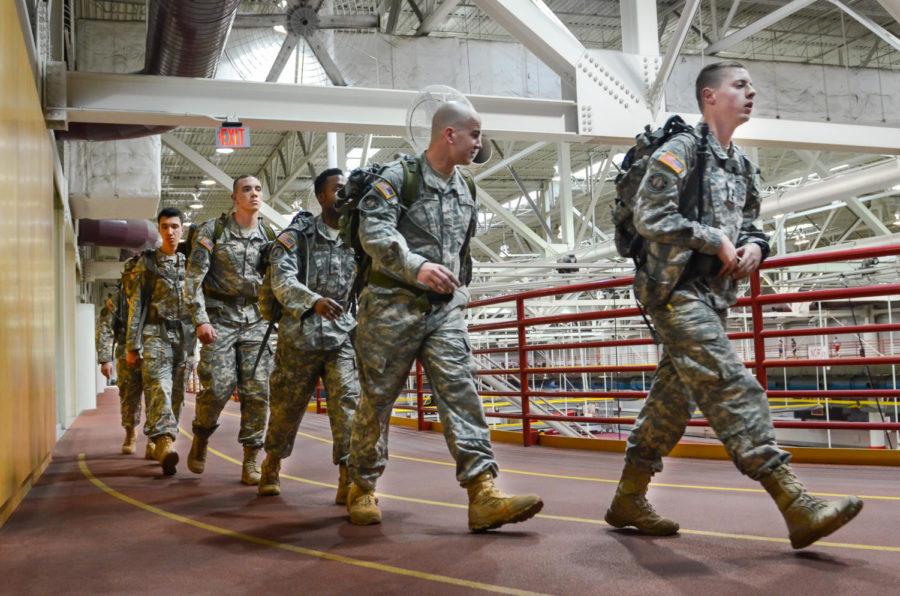 Captain Ray Kiemen, right, is leading Brad Schuler, Tyriq Isles, Aaron Hett, Dakota Palomo and Christian Stornello during practice March 13 in Lied Recreation Athletic Facility. Army ROTC students will be going to New Mexico to participate in a Bataan Death March reenactment.