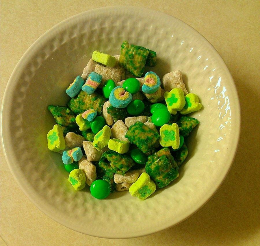 A bright green snack filled with lucky charms. 