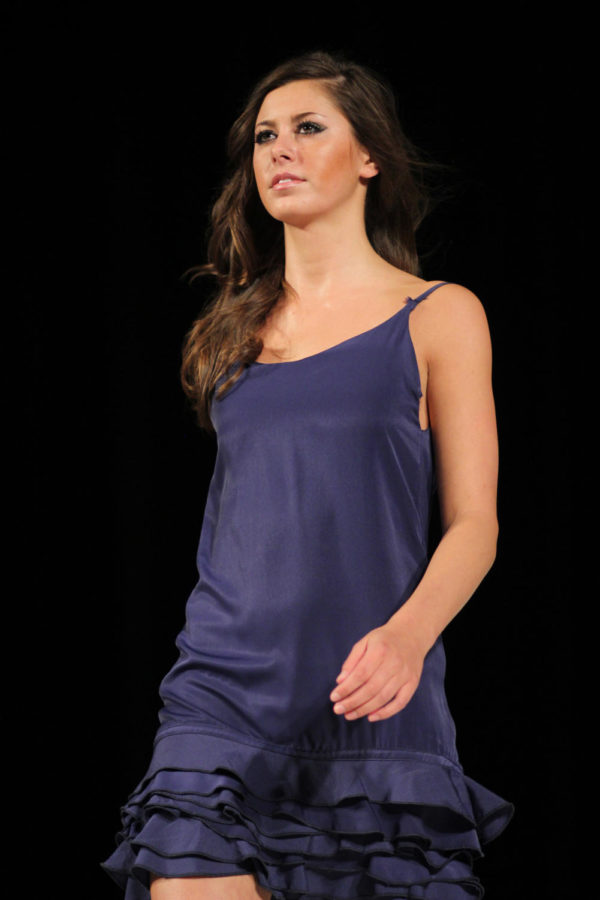 Katherine Sheridan, sophomore in apparel, merchandising and design, models in the 2013 ISU Fashion Show on April 13, 2013.