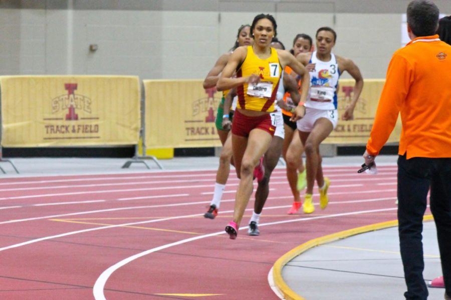 Senior Ejiroghene Okoro leads the pack in the Womens 800m run. She later placed first in the event with a time 2:05.43.