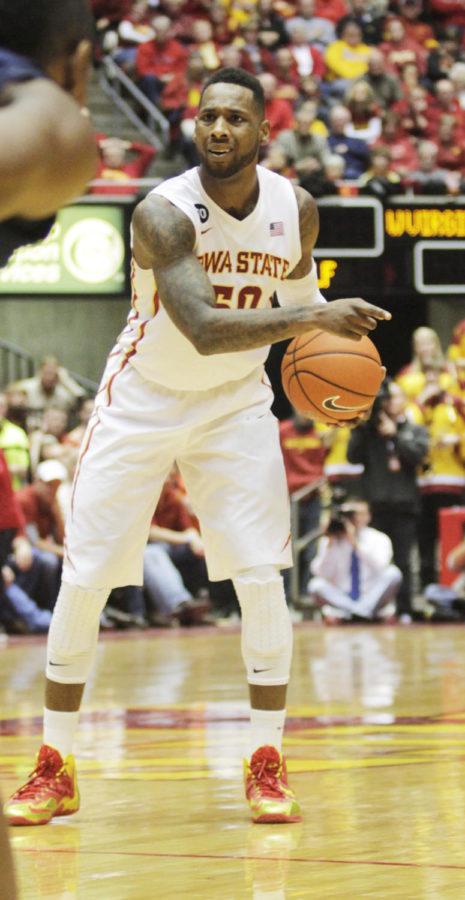 Senior DeAndre Kane signals for his teammates to move during the second half of the game against West Virginia on Wednesday, Feb. 26, 2014. The No. 15 Cyclones defeated the Mountaineers 83-66.