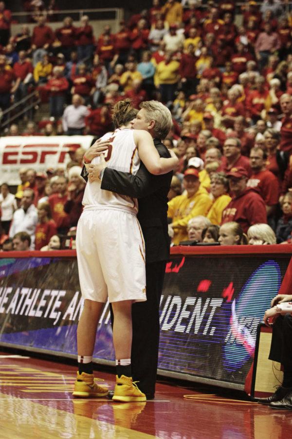 ISU coach Bill Fennelly embraces emotional senior forward Hallie Christofferson after Iowa State lost to Florida State 55-44 in the first round of the NCAA Tournament in Ames, Iowa. This was Christoffersons final game for the Cyclones.