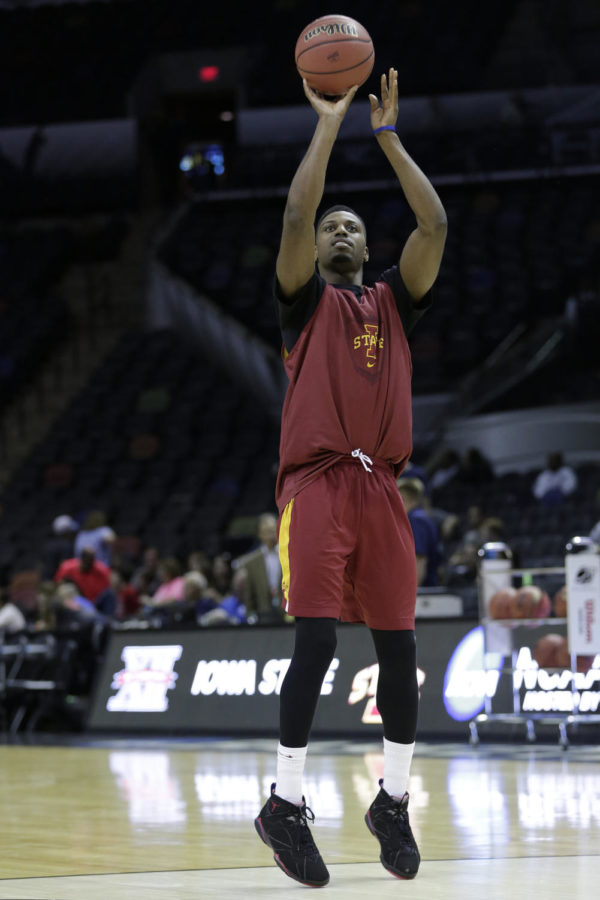 Senior forward Melvin Ejim practices shooting during the open practice. The Iowa State mens basketball team had an open practice Thursday, March 20 at the AT&T Center in San Antonio, Texas. 