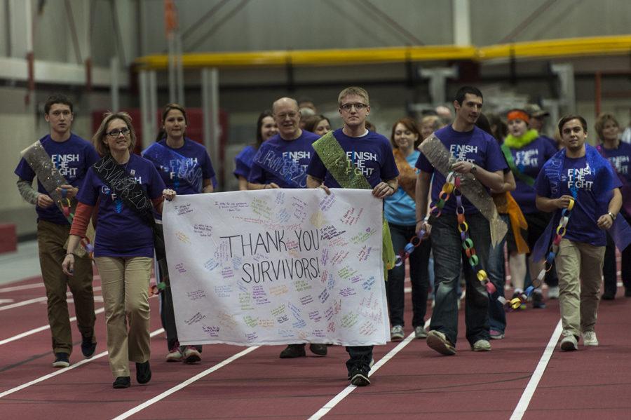Cancer+survivors+and+supporters+walk+on+the+track+to+honor+the+successful+fight+against+cancer.+Iowa+State+hosted+Relay+for+Life+at+Lied+Recreation+Center+on+Friday%2C+March+7.