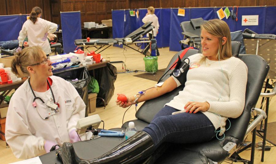 Lynnely Parker, a senior in apparel merchandising and design and member of Chi Omega, donates blood in the ISU Blood Drive on March 27.