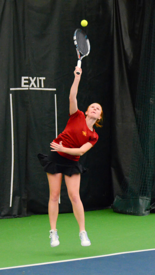 Senior Meghan Cassens serves the ball during Iowa States 5-2 loss to Drake on Mar.7 at Ames Racquet and Fitness Center.