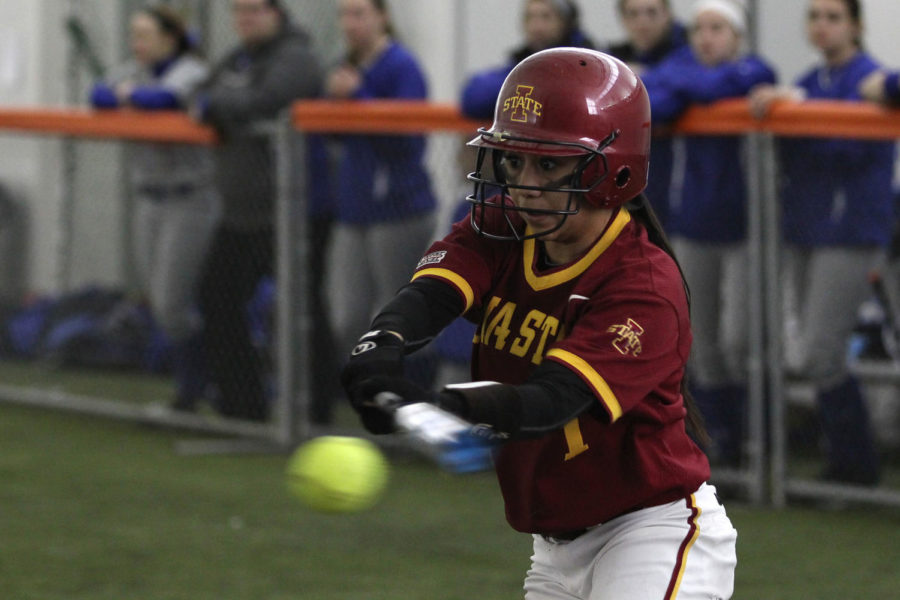 Sophomore Brittany Gomez swings for the ball during the Cyclones game against South Dakota State at the Bergstrom Football Complex on Feb. 9. The Cyclones beat the Jackrabbits 4-1.