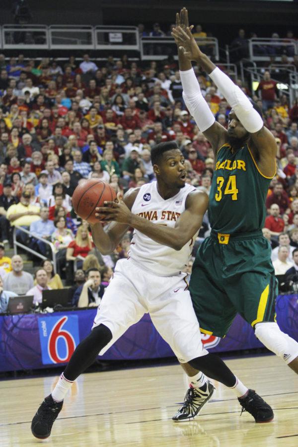 Senior forward Melvin Ejim works is way around Baylor's Cory Jefferson during the first half at the 2014 Phillips 66 Big 12 Championship finals in Kansas City, Mo. on March 15. The Cyclones defeated the Bears 74-65 in their first final-round appearance since 2000. Ejim had 10 points for Iowa State.