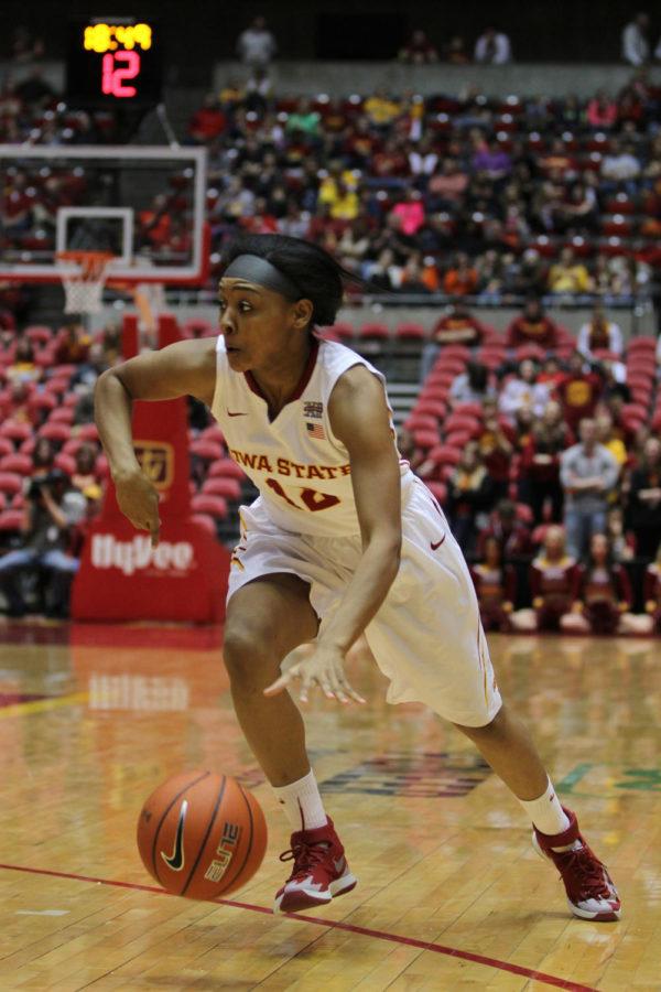 Freshman guard Seanna Johnson drives the ball down court during the game against the Texas Longhorns at Hilton Coliseum Saturday, Feb. 22. After a slow start, the Cyclones offense picked up and went neck-and-neck with the Longhorns until they hit a 13-0 run to pick up the lead. Freshman guard Seanna Johnson looks to score during the game against the Texas Longhorns at Hilton Coliseum on Saturday, Feb. 22. After a slow start, the Cyclones offense picked up and went neck-and-neck with the Longhorns until they hit a 13-0 run to pick up the lead. They took the win 81-64, putting Iowa State at 18-8 and 7-8 in the Big 12.