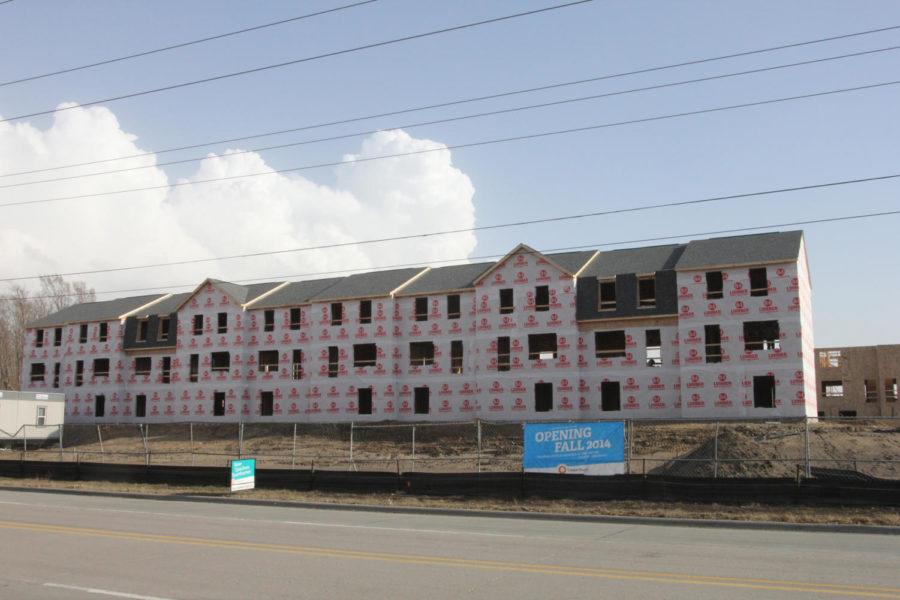 Copper Beech apartment buildings are being built across from the Grove on South Grand Avenue. The new apartments are scheduled to open in the fall of 2014.