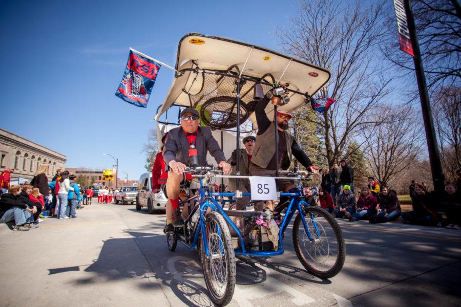 People enjoy riding in the Veishea parade on April 20, 2013 to show everyone their creative designs.
