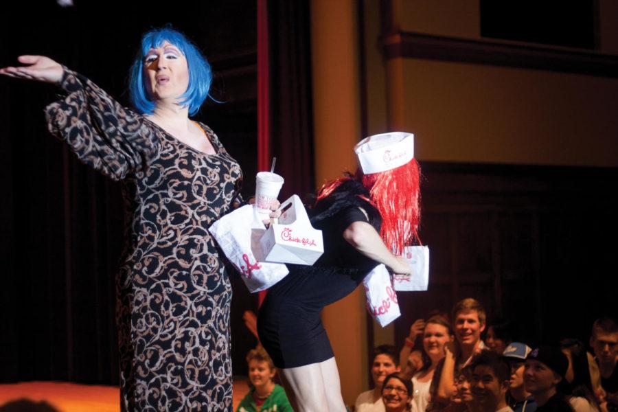 Clint Currie and Elliott Devore, graduate assistant-administrative in educational leadership and policy studies, perform a spoof of Hold On by Wilson Phillips Friday, April 6, during the LGBTA Drag Show in the Great Hall of the Memorial Union.
